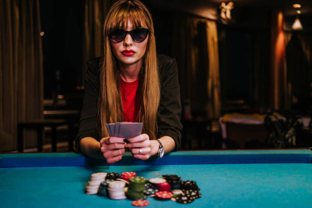 Roulette wheel with ball landing in pocket, multiple betting zones visible on table layout